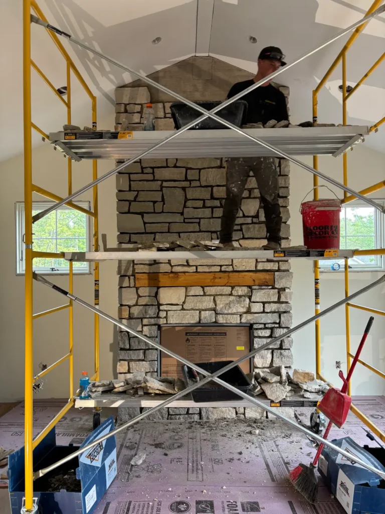 In progress installation of a new Stone Fireplace